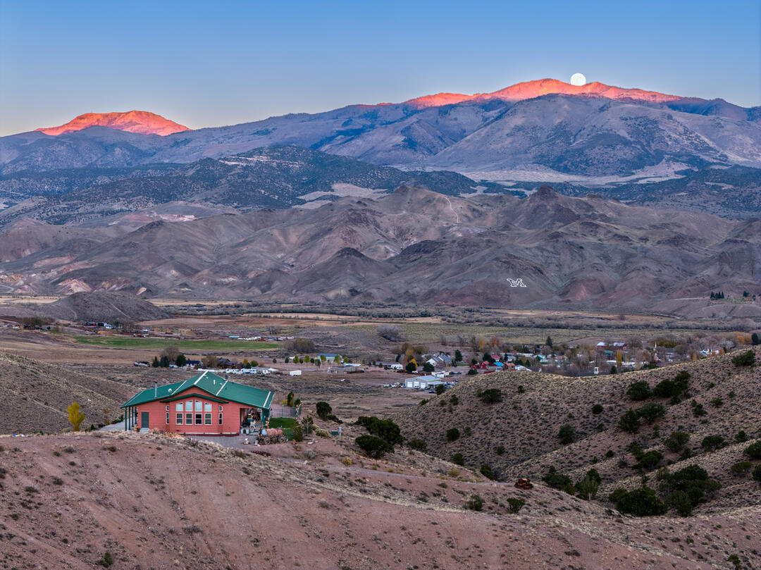 Aerial Photo of a home in Marysvale Utah with the moon rising