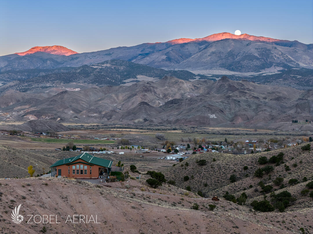 Aerial Photo of a home in Marysvale Utah with the moon rising