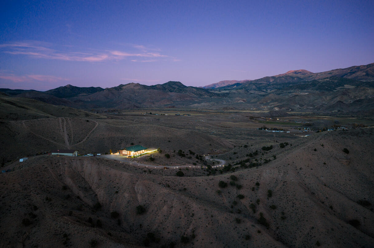 A house in the desert at dusk