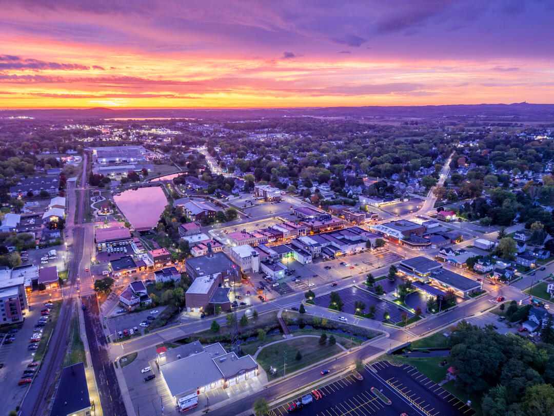 A city with a colorful sunrise
