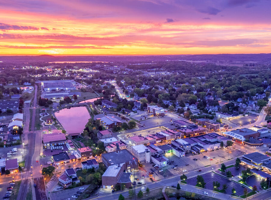 Farm in the country surounded by fields
