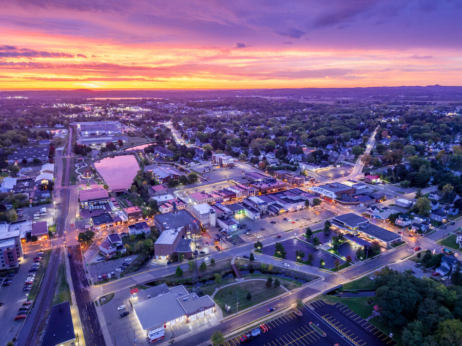 Farm in the country surounded by fields